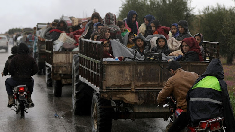 People flee the town of Afrin in Syrian Kurdistan after its invasion by the Turkish army and its Free Syrian Army (FSA) proxies, March 15, 2018. (Photo: Reuters)