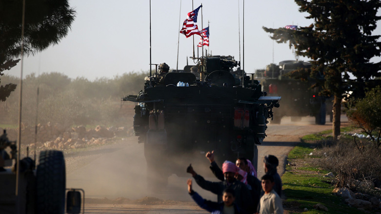 A convoy of US forces armoured vehicles drives near the village of Yalanli, on the western outskirts of the northern Syrian city of Manbij, on March 5, 2017. (Photo: AFP)