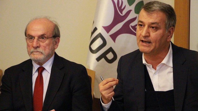 HDP's Mahmut Togrul (R) speaks during a press conference at the Turkish Parliament, March 8, 2018. (Photo: HDP)
