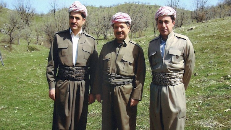 Former Kurdistan Region President Masoud Barzani (center) stands next to Kurdistan Region Prime Minister Nechirvan Barzani (left) and his twin brother Dilovan Barzani. (Photo: Archive)