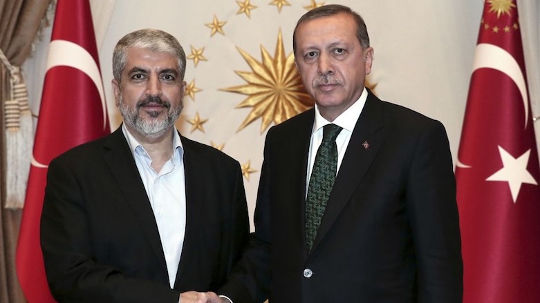 Turkey's President Recep Tayyip Erdogan (right) shakes hands with Palestinian Islamic Resistance Movement Hamas leader Khaled Mashal before a meeting at the Turkish presidential palace in Ankara, Aug. 12, 2015 (Photo: Associated Press)