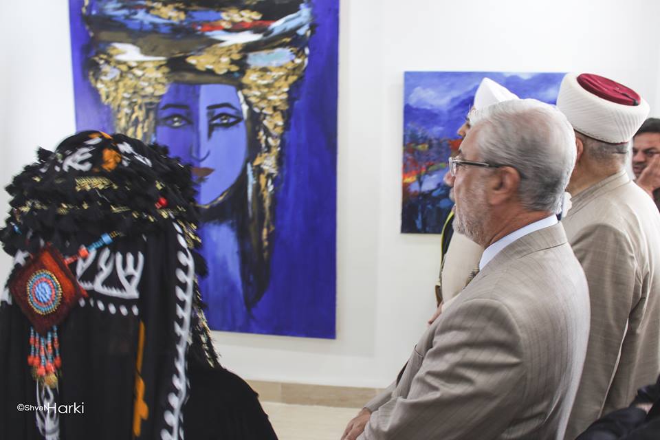 Muslim clerics attend an art exhibition at the Altun Mosque in the Kurdistan Region capital of Erbil. (Photo: Shvan Harki)