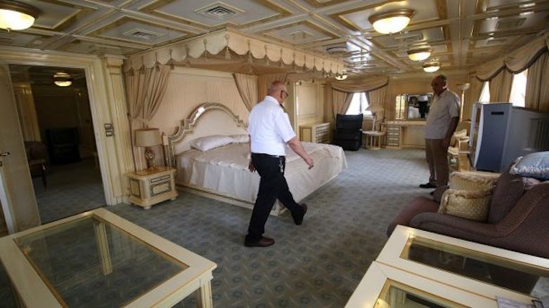 A captain walks inside the yacht called the 