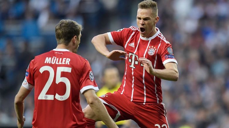 Bayern Munich defender Joshua Kimmich celebrates with his teammate after scoring his side's opening goal in their UEFA Champions League semifinal second-leg at the Estadio Santiago Bernabéu in Madrid, Spain, May 1, 2018. (Photo: UEFA)