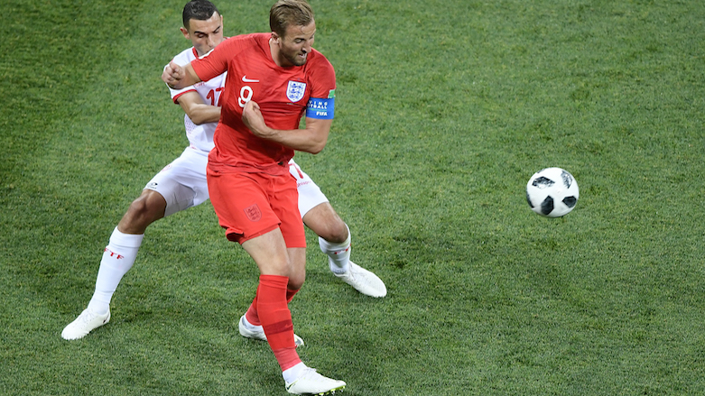 Tunisia's midfielder Ellyes Skhiri (left) vies for the ball with England's forward Harry Kane during the 2018 World Cup Group G football match between Tunisia and England at the Volgograd Arena in Volgograd, Russia, on June 18, 2018. (Photo: AFP/Nicolas Asfouri)