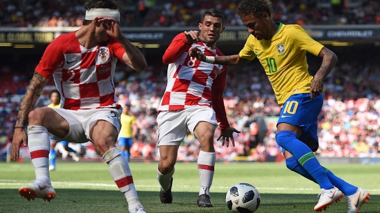 Brazil's Neymar (R) vies with Croatia's defender Sime Vrsaljko (L) and Croatia's midfielder Mateo Kovacic (C) in the build-up to scoring the opening goal of the international friendly football match between Brazil and Croatia at Anfield in Liverpool on June 3, 2018. (Photo: AFP/Oli Scarff)