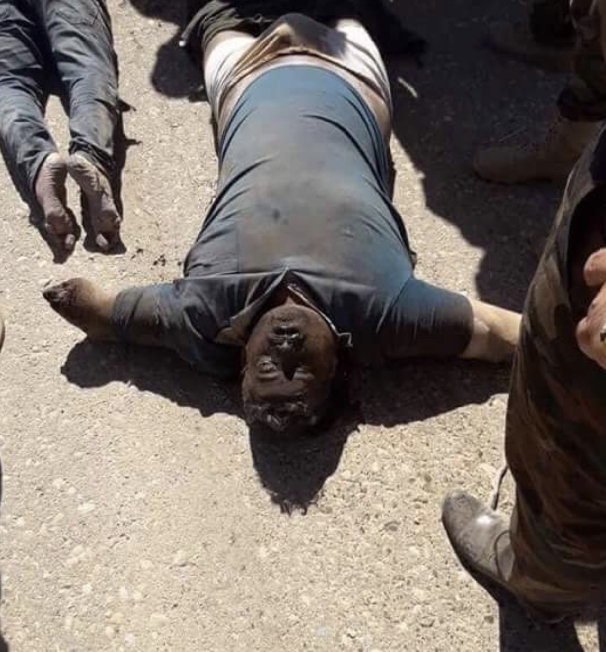 PHOTOS: Iraqi security forces discover bodies of six men in IS hostage video