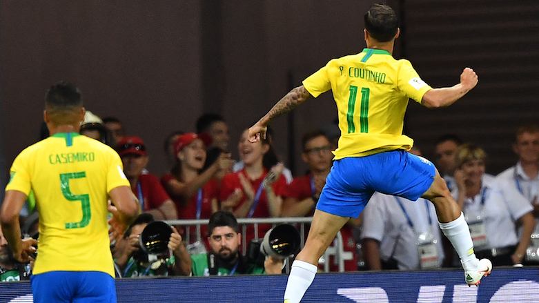 Brazil's forward Philippe Coutinho (right) celebrates his goal during the 2018 World Cup Group E football match between Brazil and Switzerland at the Rostov Arena in Rostov-On-Don, Russia, on June 17, 2018. (Photo: AFP/Joe Klamar)