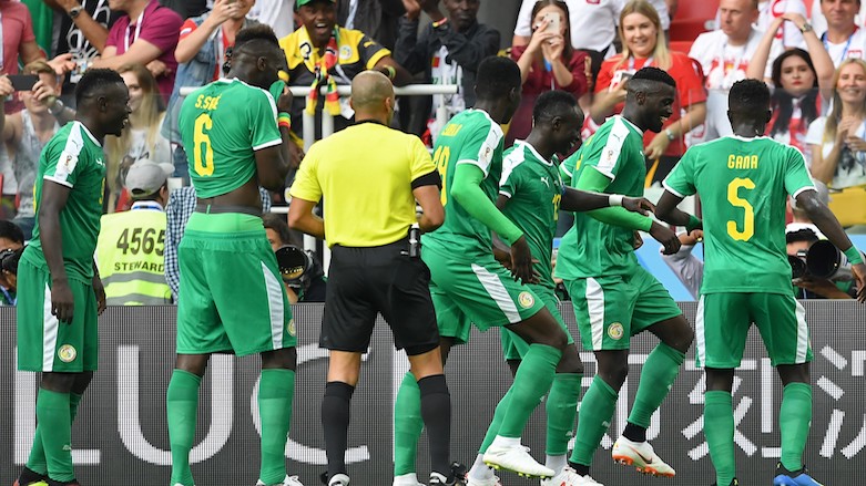 Senegal's forward Mbaye Niang (second from right) celebrates after scoring his team's second goal during the 2018 World Cup Group H football match between Poland and Senegal at the Spartak Stadium in Moscow, Russia on June 19, 2018. (Photo: AFP/Francisco Leong)