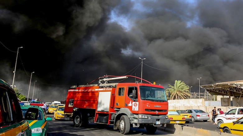 A firetruck arrives at the scene of a blaze at a warehouse storing the ballot boxes from the May 12 parliamentary elections. (Photo: AFP)