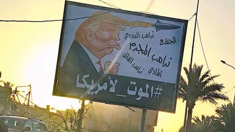 اللافتات نصبت في الاحياء التي تهيمن عليها فصائل شيعية - صورة تداولها ناشطون على فيسبوك