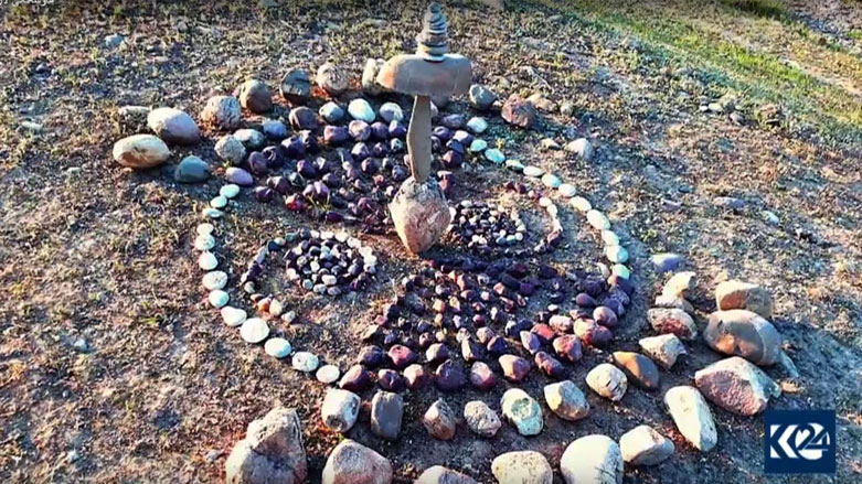 An extended rock sculpture by Artist John Safin. (Photo: Kurdistan 24)