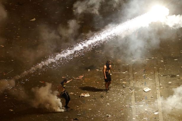 PHOTOS: Two fans dead as World Cup celebrations in France turn violent