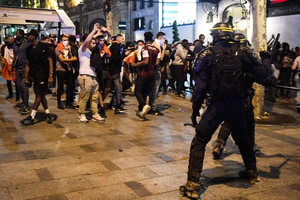PHOTOS: Two fans dead as World Cup celebrations in France turn violent