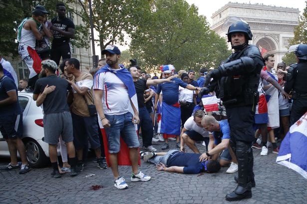 PHOTOS: Two fans dead as World Cup celebrations in France turn violent