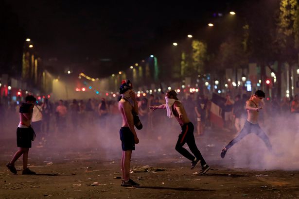 PHOTOS: Two fans dead as World Cup celebrations in France turn violent