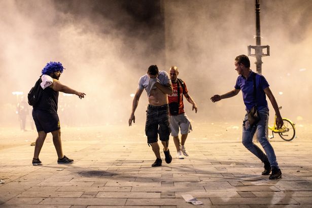 PHOTOS: Two fans dead as World Cup celebrations in France turn violent
