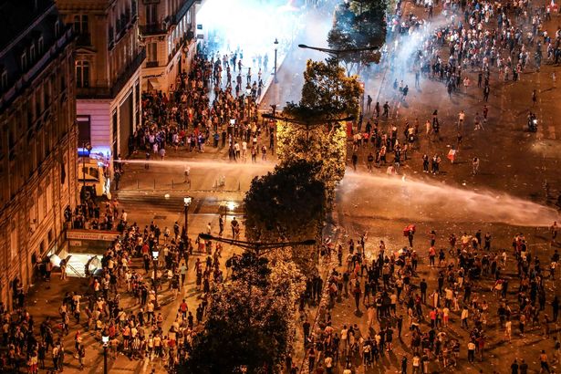 PHOTOS: Two fans dead as World Cup celebrations in France turn violent