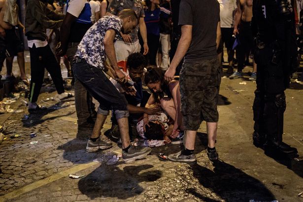 PHOTOS: Two fans dead as World Cup celebrations in France turn violent