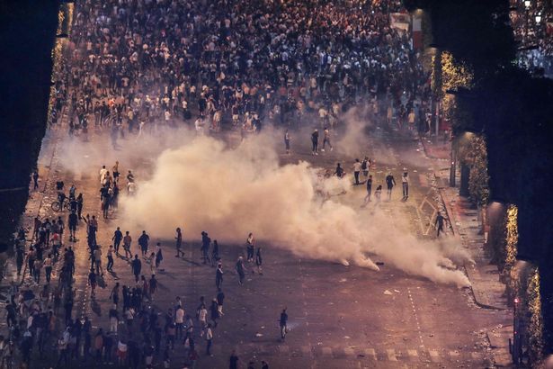 PHOTOS: Two fans dead as World Cup celebrations in France turn violent