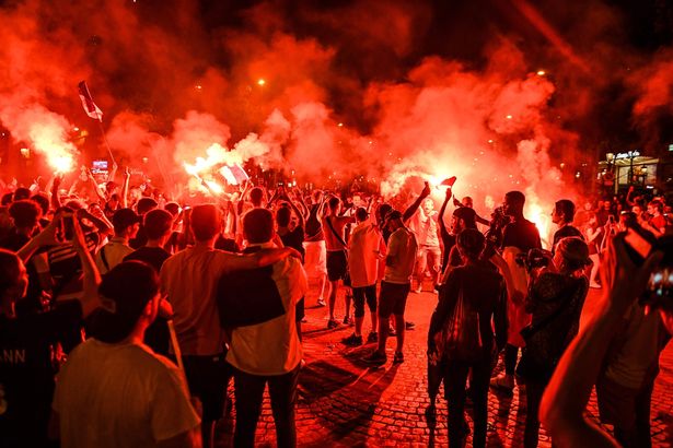 PHOTOS: Two fans dead as World Cup celebrations in France turn violent