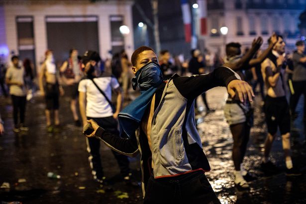 PHOTOS: Two fans dead as World Cup celebrations in France turn violent