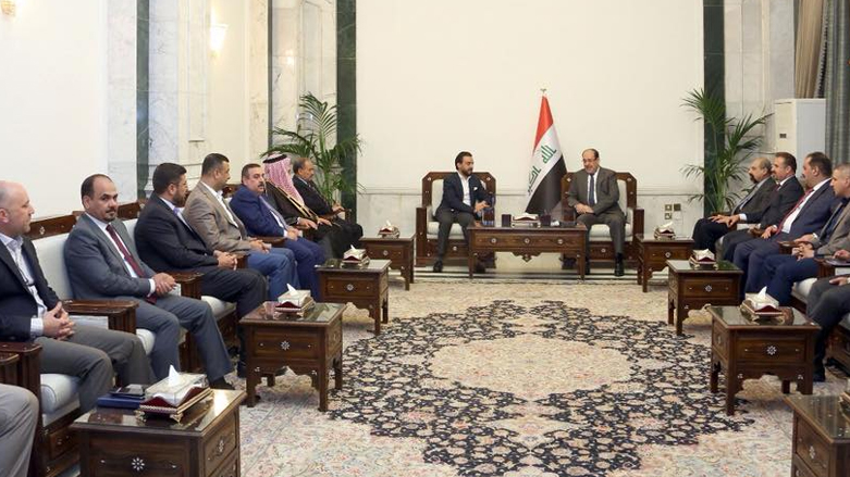 المالكي يستقبل في مكتبه الرسمي مساء الأحد وفدا سياسيا يضم النواب الفائزين عن محافظة الانبار برئاسة محمد الحلبوسي (صورة: مكتب المالكي)