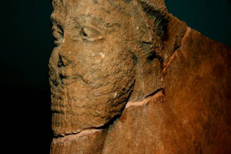 An ancient statue at the Iraqi National Museum severely damaged when looters cut off its head in 2003, to be hastily reattached years later, Baghdad, Feb. 24, 2009. (Photo: Daniel W. Smith) 