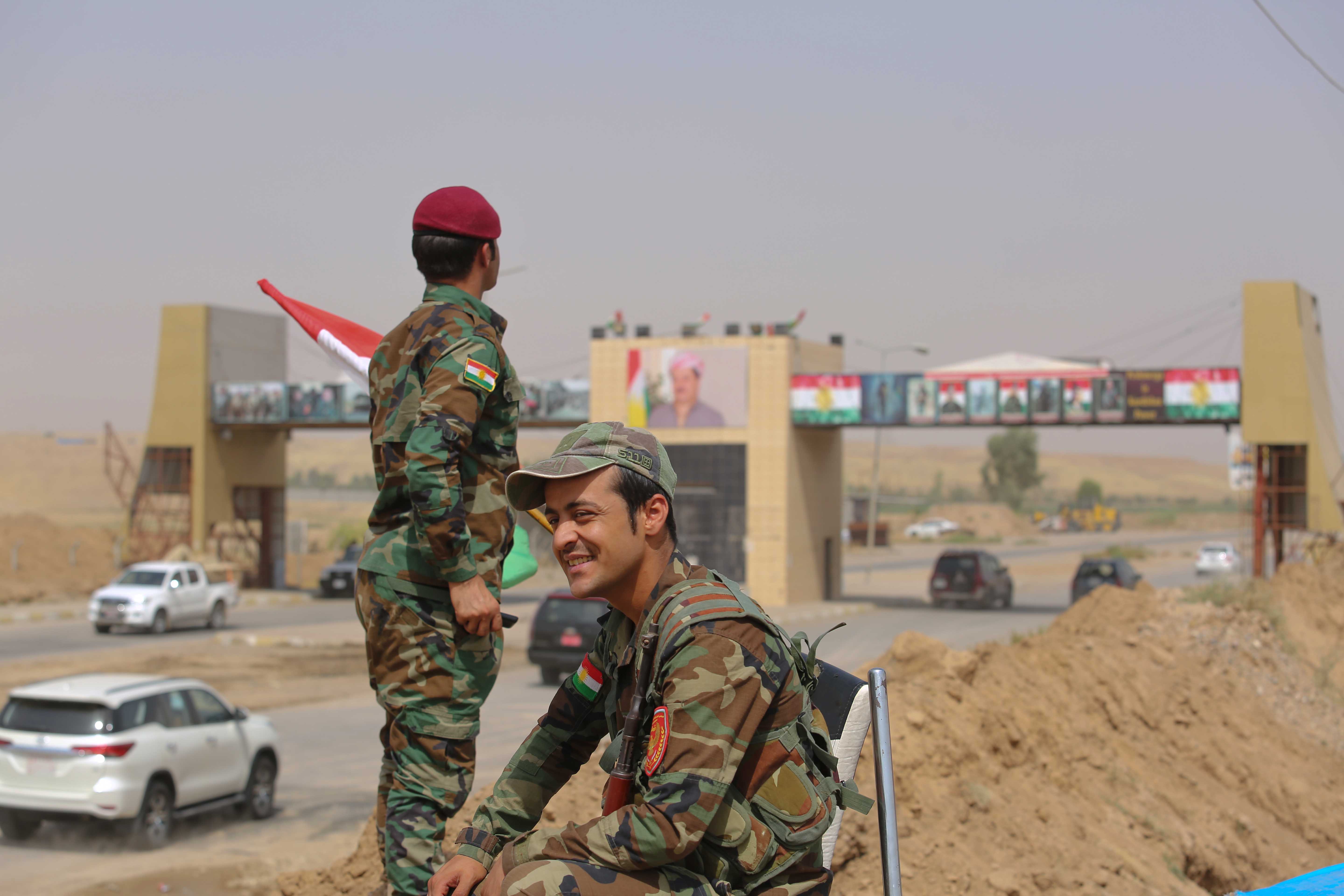 Both Erbil police and Iraqi federal police officers were present during the reopening of the road. (Photo: Kurdistan 24/Shvan Harki)