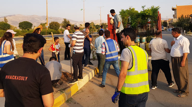 Volunteers planted trees in Halabja, Aug. 3, 2018. (Photos: Kurdistan 24/Wladimir van Wilgenburg)