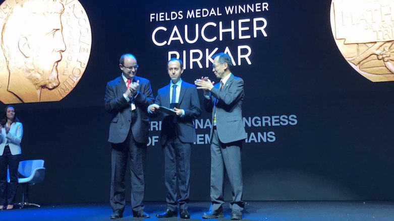 Caucher Birkar is applauded upon receiving the Fields Medal award at a ceremony in Rio de Janeiro, Brazil, Aug. 1, 2018. (Photo: ICM)