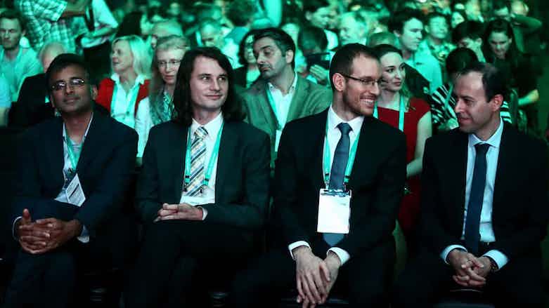 Caucher Birkar (right) with the other medal winners at the Fields awards ceremony in Rio de Janeiro, Brazil, Aug. 1, 2018. (Photo: Fabio Motta/Courtesy IMC 2018)