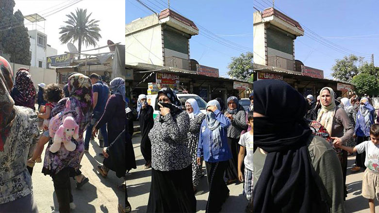 به‌وێنه‌.. ئافره‌تانی جندرێس له‌دژی گروپه‌ چه‌كداره‌كانی ئۆپۆزسیۆن راپه‌ڕین