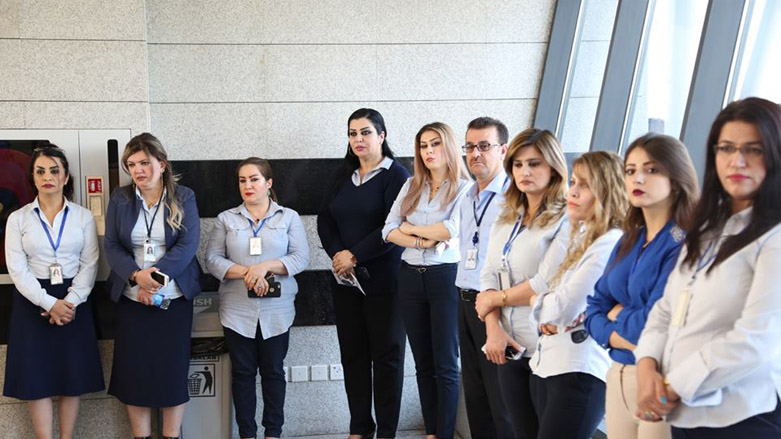 Staff of the Sulaimani Province’s international airport during the opening ceremony of a new terminal, Aug. 06, 2018. (Photo: Ibrahim Fattah/Kurdistan 24)