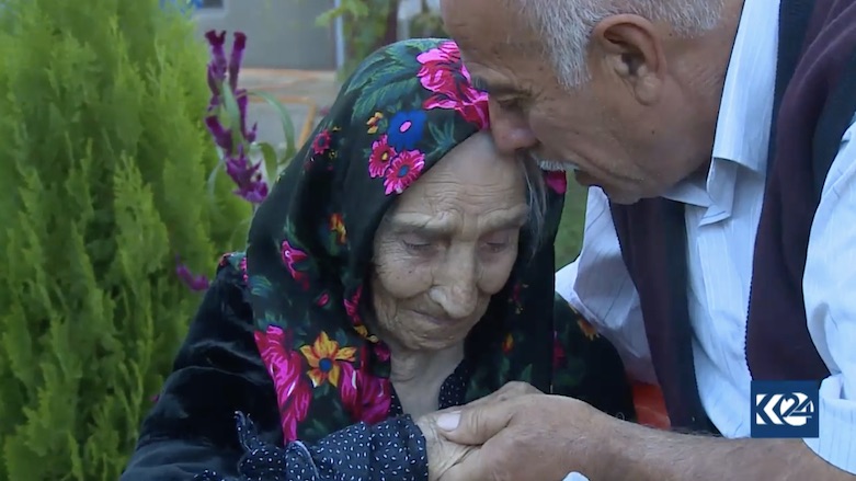 Dayka Bilol is in tears as she reunites with her brother. (Photo: Kurdistan 24) 