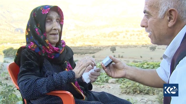 Ibrahim shares a laugh with his older sister after they were reunited. (Photo: Kurdistan 24)