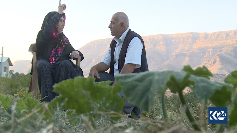 Ibrahim sits with his older sister who he has not seen for over 50 years. (Photo: Kurdistan 24)