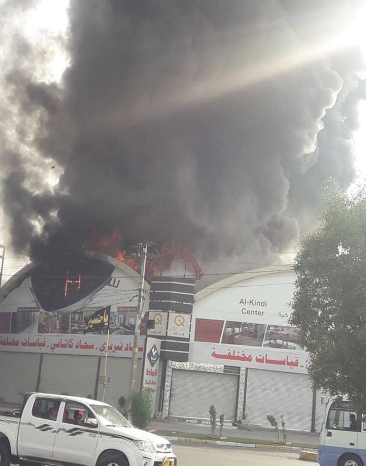 Black smoke rises in one of the central districs in Baghdad, Oct. 20. 2018. (Photo: Social Media)
