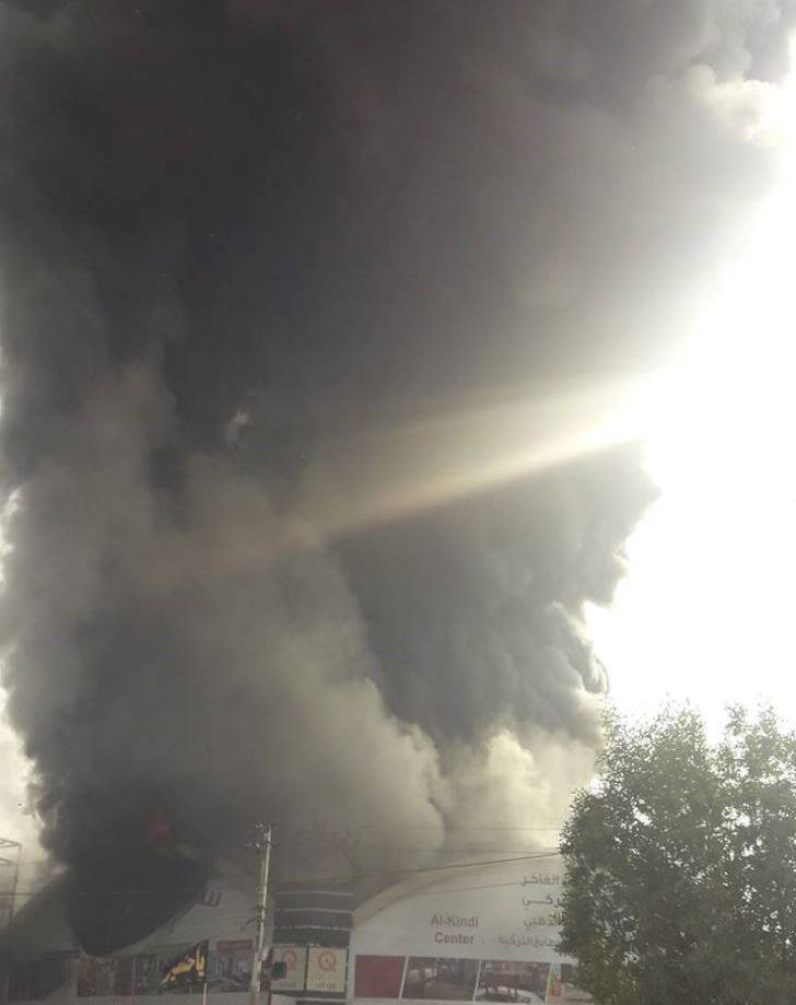 Black smoke rises in one of the central districs in Baghdad, Oct. 20. 2018. (Photo: Social Media)