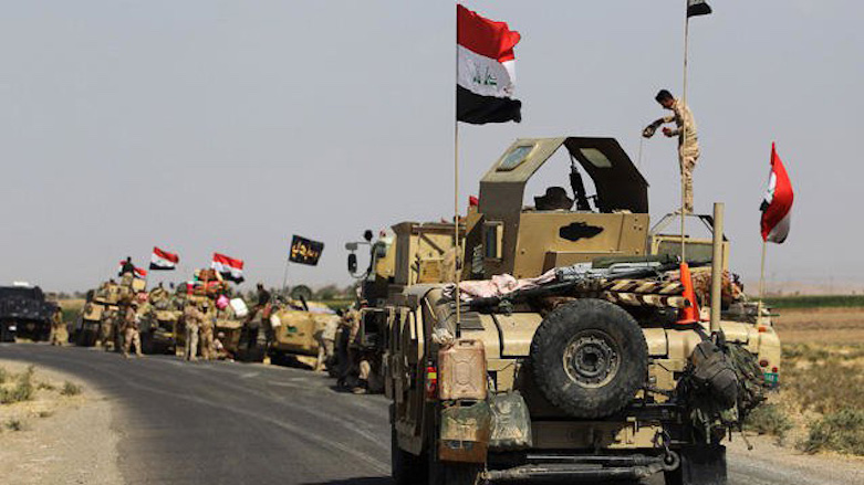 Iraqi forces drive toward Kurdish Peshmerga positions on Oct. 15, 2017, on the southern outskirts of Kirkuk. (Photo: AFP)
