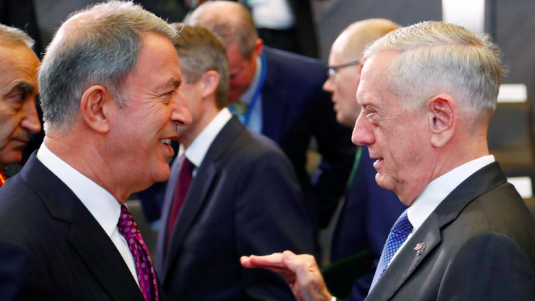 Turkey's Defence Minister Hulusi Akar speaks with US Secretary of Defense Jim Mattis during a meeting of NATO defense ministers at the alliance’s headquarters in Brussels, Belgium, Oct. 4, 2018. (Photo: Reuters)
