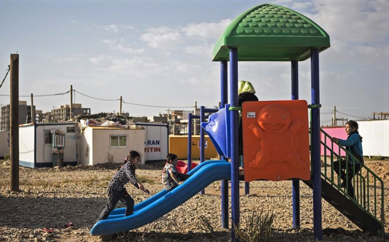 Children play in a camp in Sarpol-e Zahab as the one year anniversary of the earthquake approaches, Oct. 29, 2018. (Photo: Xinhua/Ahmad Halabisaz)