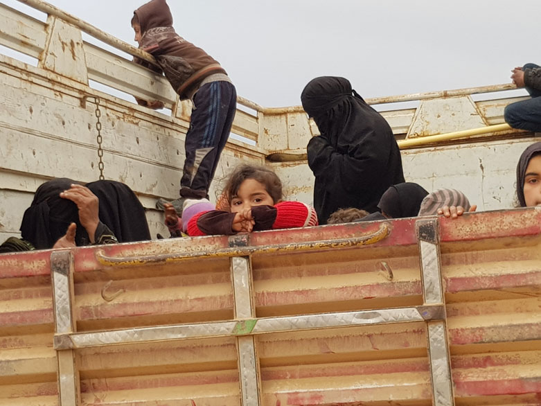 Civilians continue to flee ISIS-held territory, surrendering themselves to the Syrian Democratic Forces (SDF), February 23, 2019. (Photo: Kurdistan 24/Wladimir van Wilgenburg)