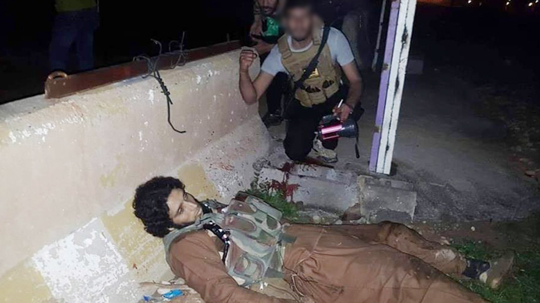 صورة احد المهاجمين مقتولاً (الحشد الشعبي)