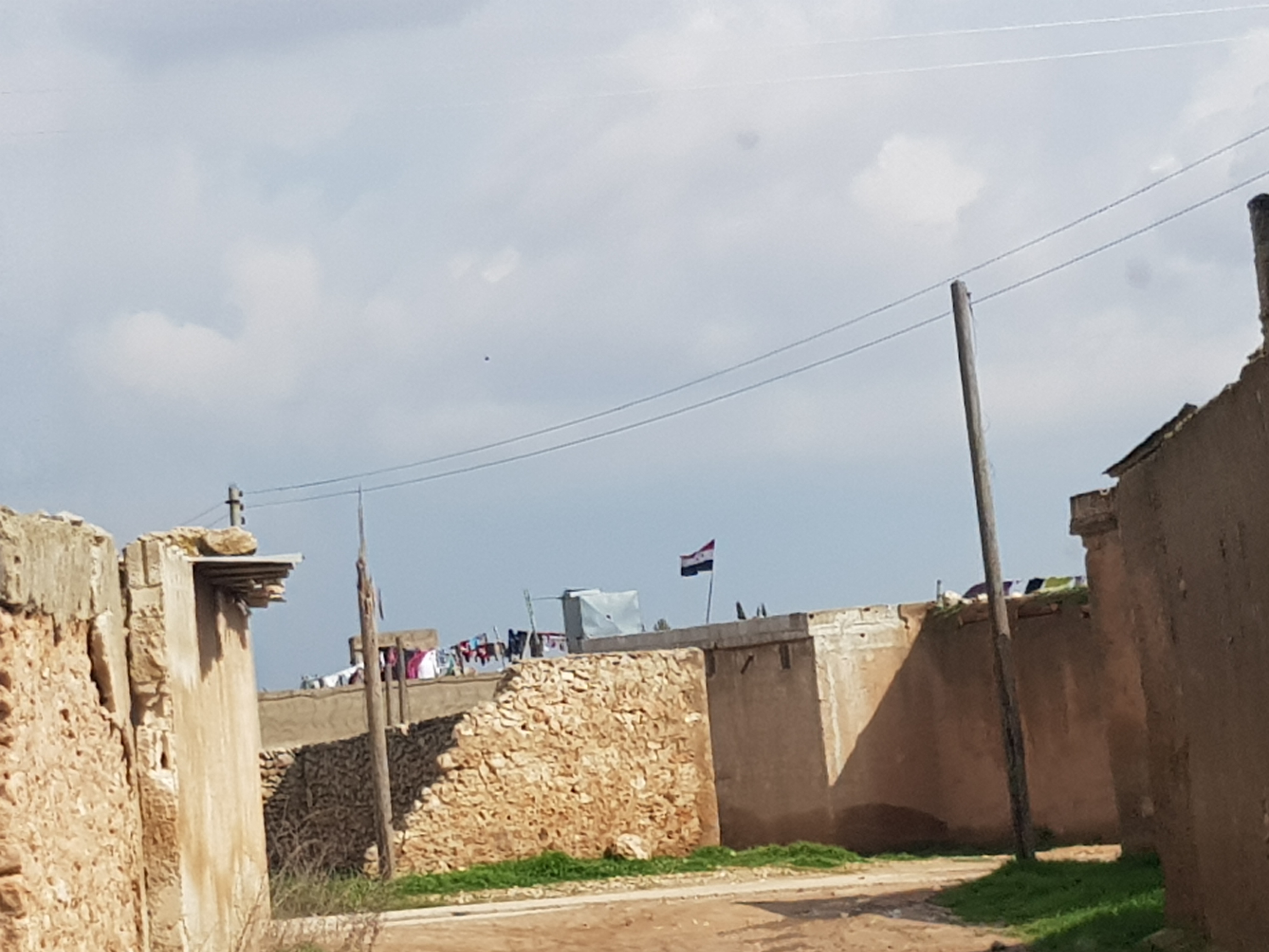 A point for Syrian border forces affiliated to the Syrian government in a village bordering Turkish-backed forces in Arima, Feb. 27, 2019 (Photo: Kurdistan 24/Wladimir van Wilgenburg)