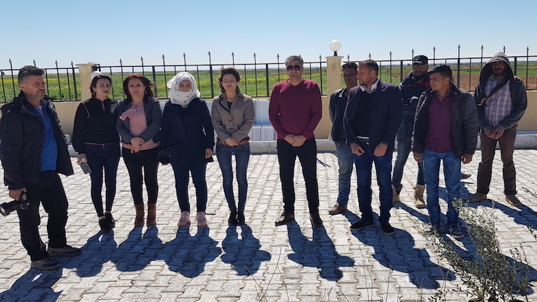 Members of The Green Party of Kurdistan plant olive trees in the town of Hazime in Raqqa's countryside with the support of the local administration, March 18, 2019. (Photo: Kurdistan 24/Wladimir van Wilgenburg)