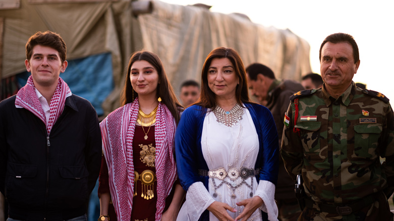 Barwari (center) with her daughter Vicky and Shapiro (left) celebrating Newroz with fellow Peshmerga. (Photo: Levi Clancy/Kurdistan 24)