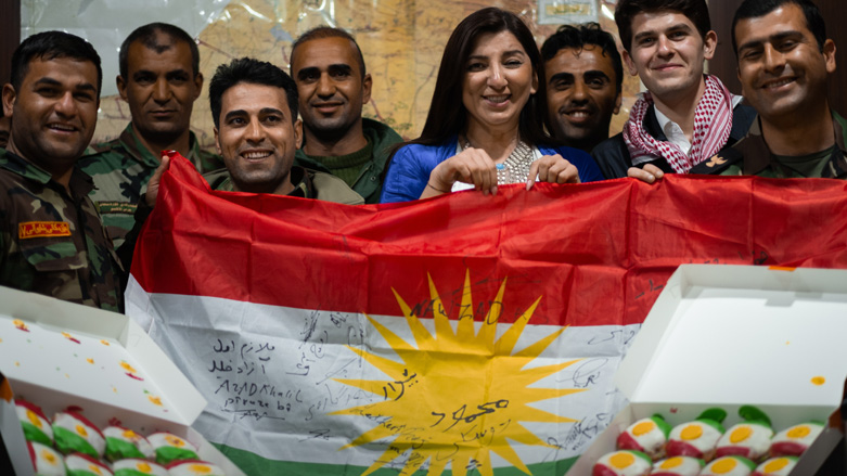 Stopping to visit one of Barwari’s fellow Peshmerga in Duhok. (Photo: Levi Clancy/Kurdistan 24)