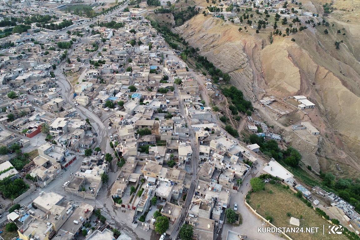 گوزەرێک بە کۆڵانه‌كانی یەکێک لەگەڕەکە دێرینەکانی دەربەندیخان 