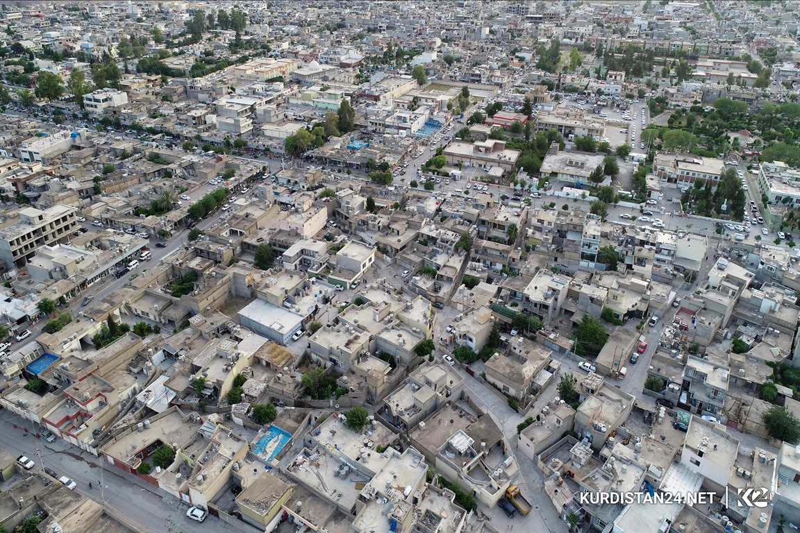 گوزەرێک بە کۆڵانه‌كانی یەکێک لەگەڕەکە دێرینەکانی دەربەندیخان 